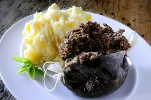 Haggis, Traditional Scottish dish, Haggis recipe, Scottish cuisine, Scottish food, How to make Haggis, Authentic Haggis recipe, Burns Night Haggis, Scottish traditions, Haggis ingredients, Haggis cooking method, Traditional Scottish food, Best way to serve Haggis, What is Haggis made of?, Where to buy Haggis in the U.S., Is Haggis healthy?, Vegetarian Haggis recipe, Traditional Scottish meals, Haggis with neeps and tatties, How to cook Haggis at home, History of Haggis in Scotland